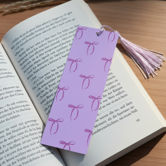Lesezeichen mit Schleifen rosa im Buch
