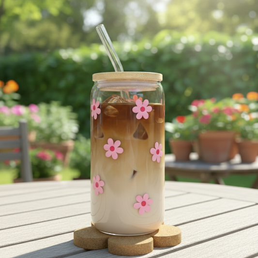 Trinkglas mit pinken Blumen